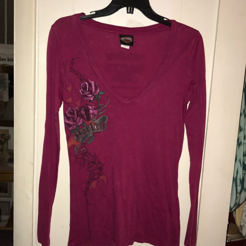 Woman’s Harley Davidson size m long sleeve shirt.